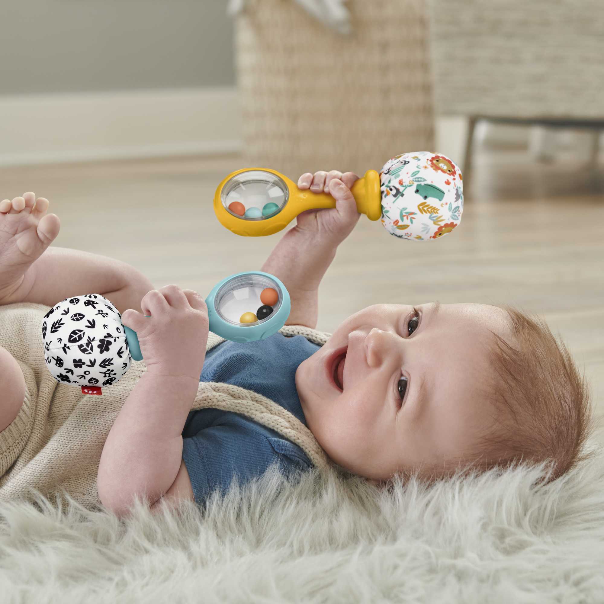 Maracas diversión y música de juguete de Fisher-Price, conjunto de 2 maracas  para bebés de más de 3 meses, colores llamativos, HMF34